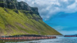 Salmon pens near Portree, Sound of Raasay, Isle of Skye, Scotland. Credit: LouieLea/Shutterstock.com