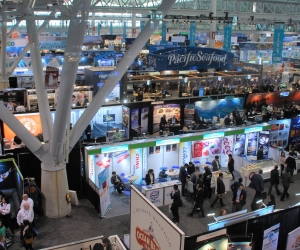 Roughly half of the 1,300 exhibits at Seafood Expo North America 2019, in Boston, as visible on the first day of the event from the catwalk above the floor.. Credit: Jason Huffman/Undercurrent News